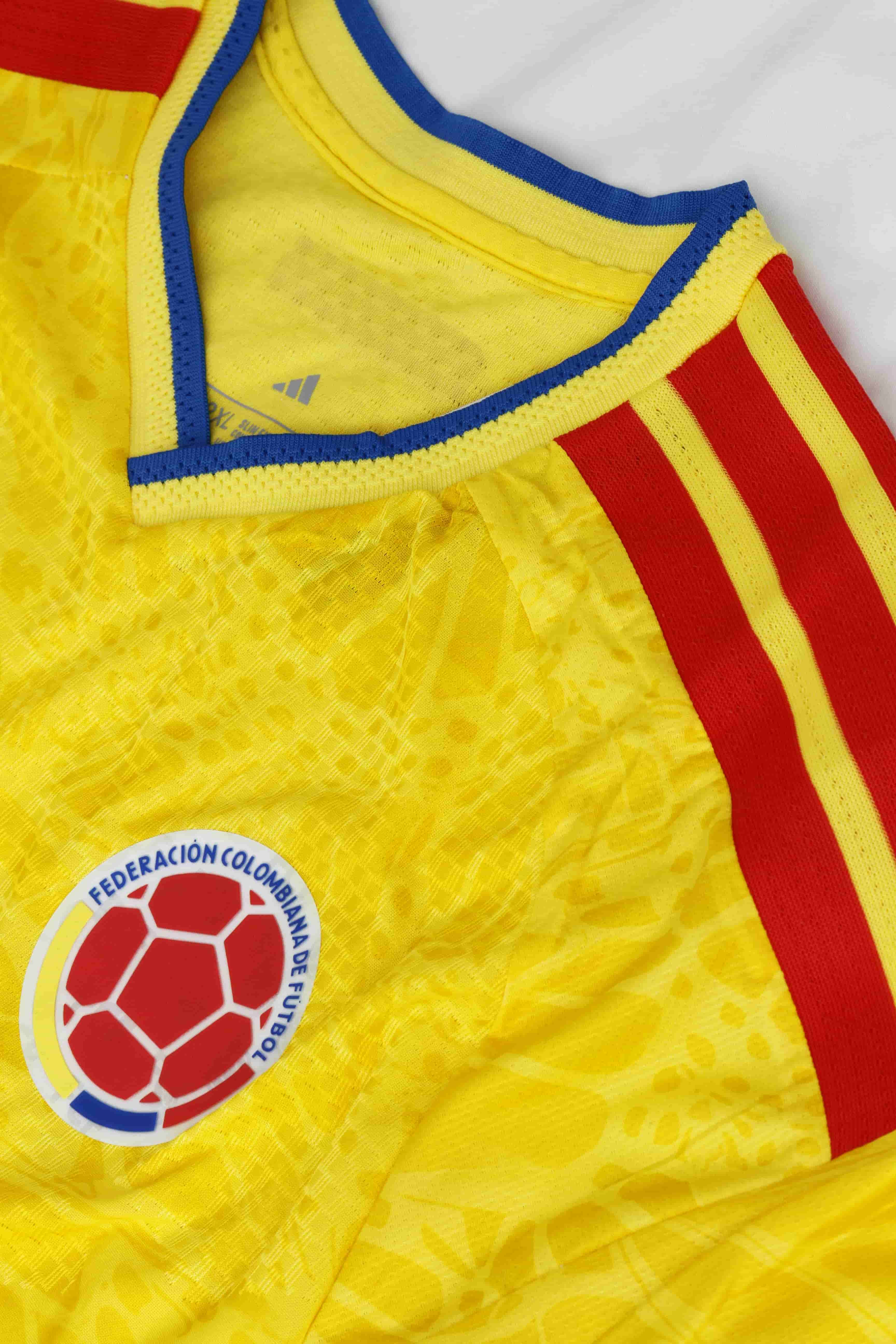 Close-up of the official yellow Colombia national football team jersey