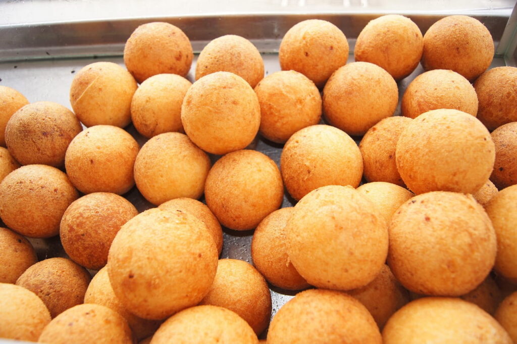 Golden Colombian buñuelos, traditional christmas cheese balls